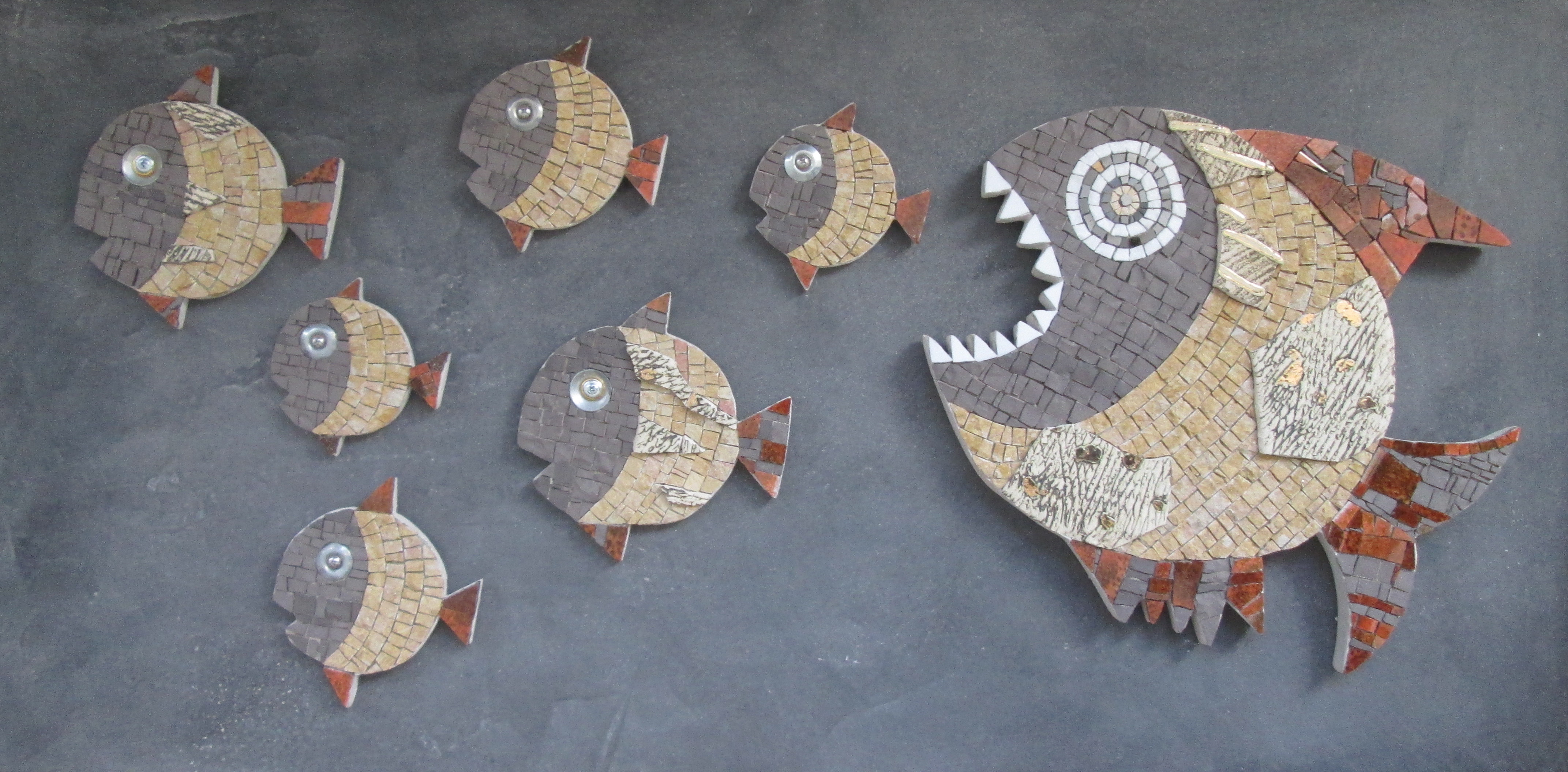 Big fish eat little fish, fish mosaics
